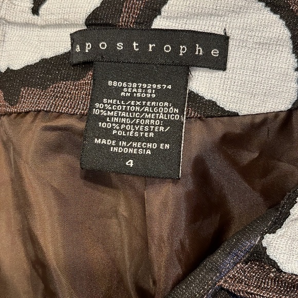 Size 4 apostrophe form fitting mini skirt.  Brown with large floral pattern. - Picture 2 of 2